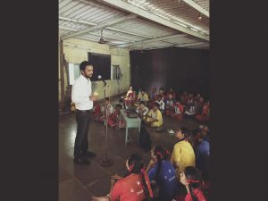 Karan Gupta addressing school children of U M Thevar High School, Dharavi during a career guidance session